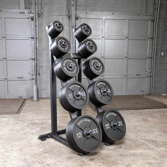 Body-Solid cast iron Olympic plate set on rack